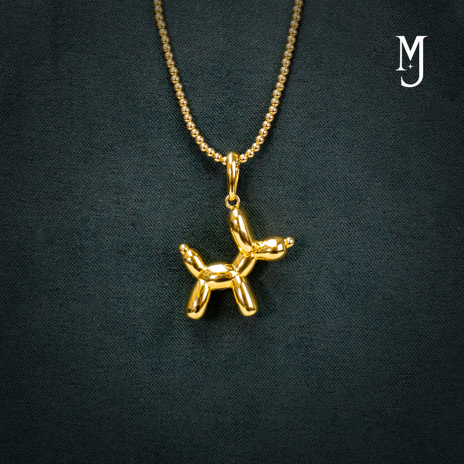 DIJE EN FORMA DE PERRO