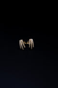Aretes de tres líneas en oro con Zirconias