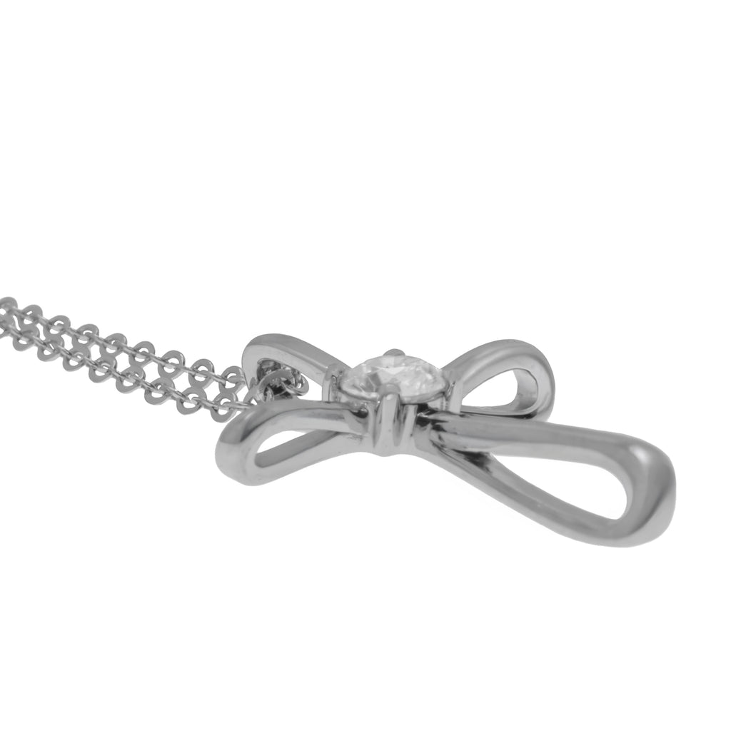 Collar cruz infinita con moissanita central