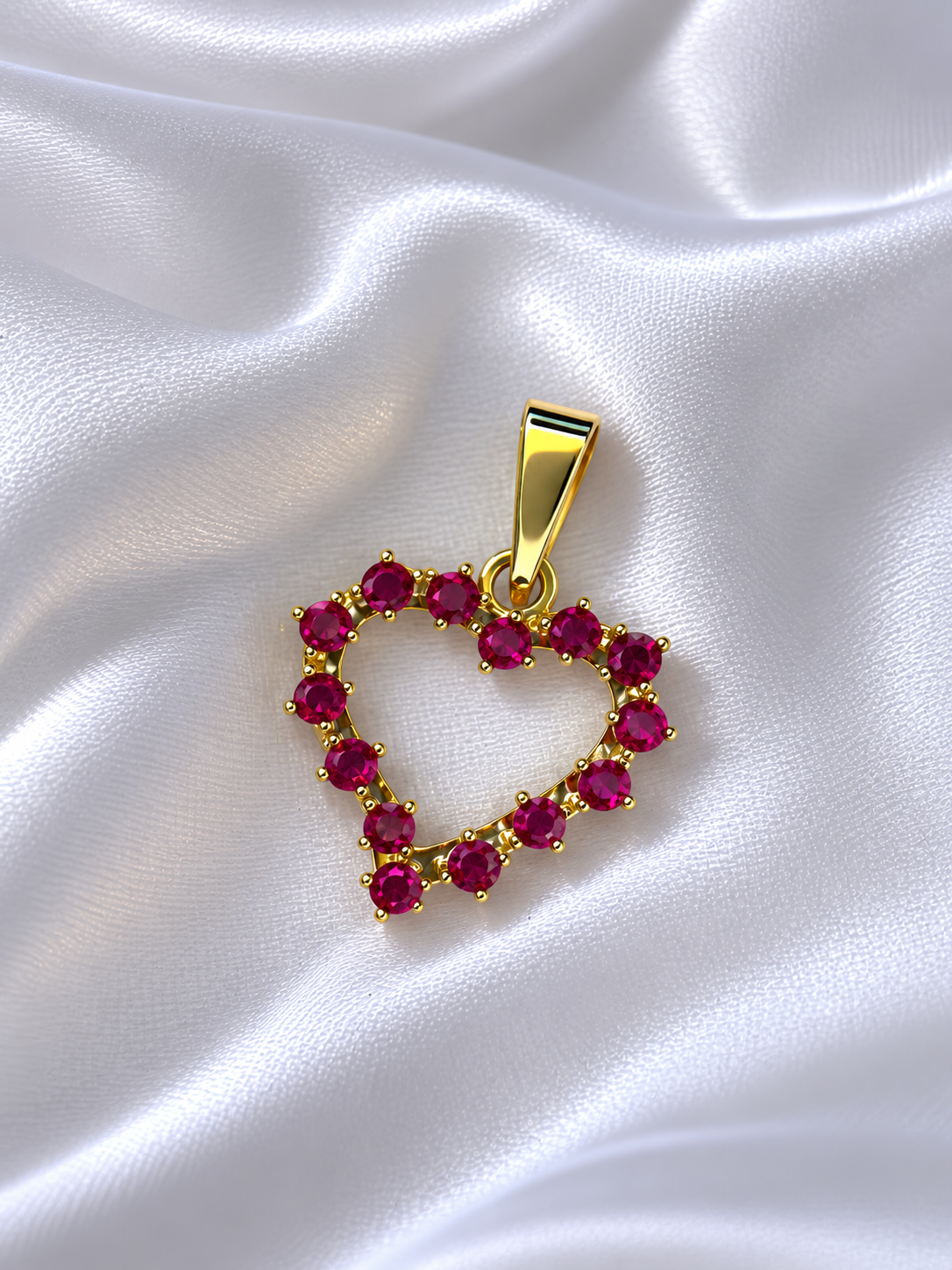 Dije corazon rubies