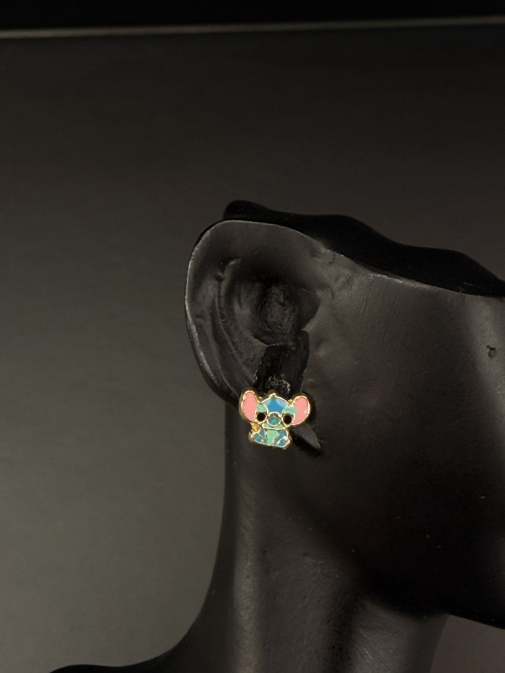 Aretes personaje azul tropical