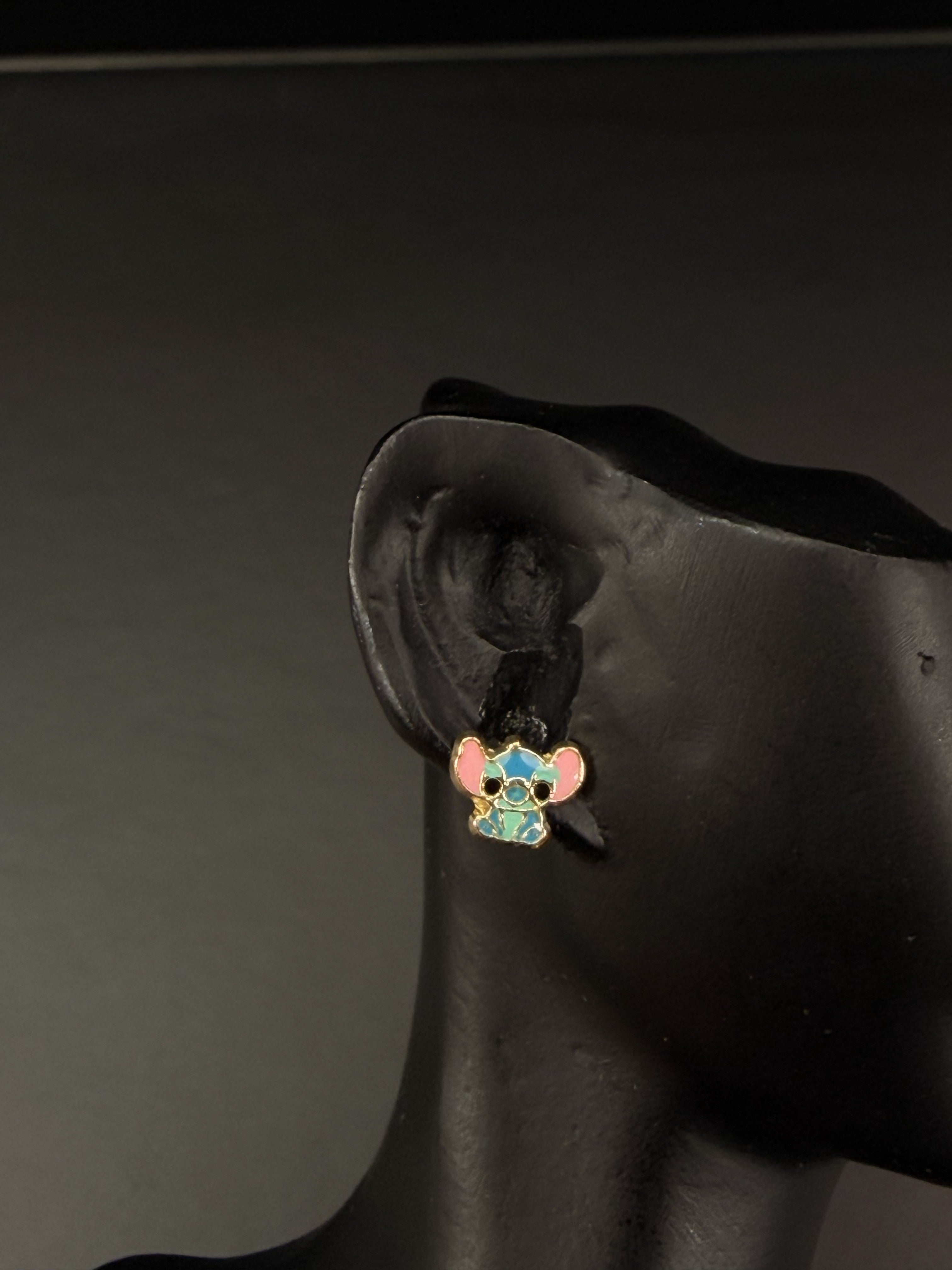 Aretes personaje azul tropical