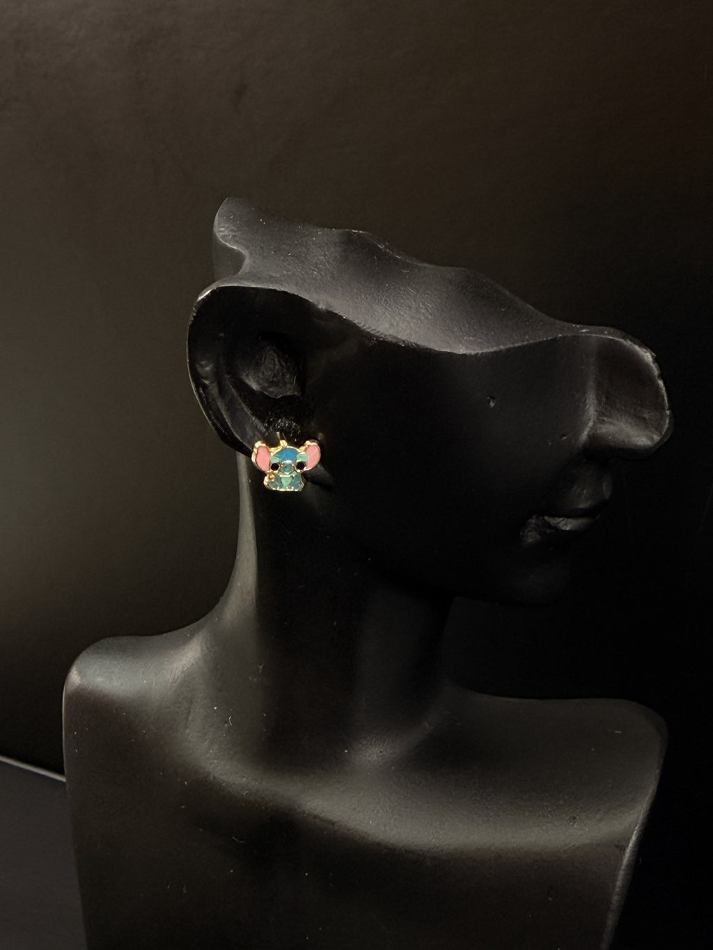 Aretes personaje azul tropical